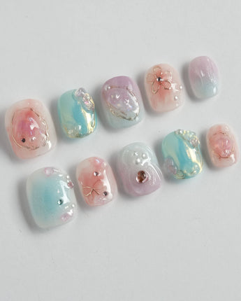 My Backyard press-on nails in extra short squoval shape — Icy Multicolor, 3D Gold Wire Florals.