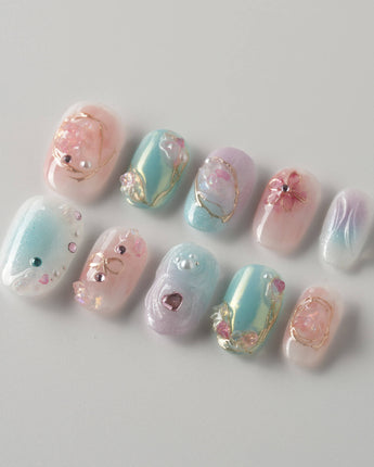 My Backyard press-on nails in short oval shape — Icy Multicolor, 3D Gold Wire Florals.