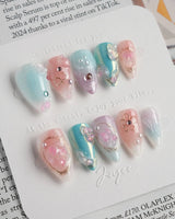 My Backyard press-on nails in short stiletto shape — Icy Multicolor, 3D Gold Wire Florals.