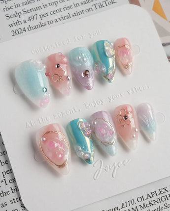 My Backyard press-on nails in short stiletto shape — Icy Multicolor, 3D Gold Wire Florals.
