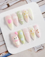 My Kitty press-on nails in medium stiletto shape — Healing Macarons, 3D Cute Cat & Paw Print Doodles.