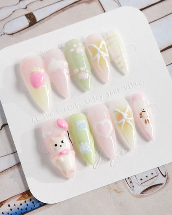 My Kitty press-on nails in medium stiletto shape — Healing Macarons, 3D Cute Cat & Paw Print Doodles.