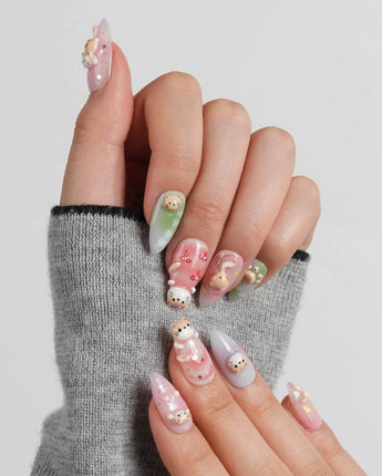 My Lulu medium short almond press-on nails with cat portrait feature nails