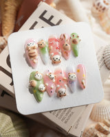My Lulu medium stiletto press-on nails with Lulu cat face and glitter stars