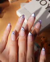 Nebula chrome French press on nails, nude base with a purple to blue to pink iridescent tip and a silver hand-drawn line - image 1