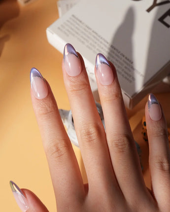 Nebula chrome French press on nails, nude base with a purple to blue to pink iridescent tip and a silver hand-drawn line - image 4