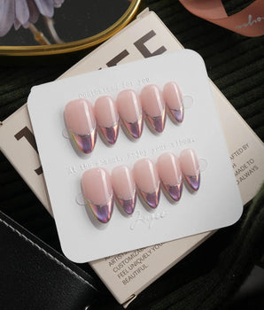 Nebula chrome French press on nails, nude base with a purple to blue to pink iridescent tip and a silver hand-drawn line - image 2