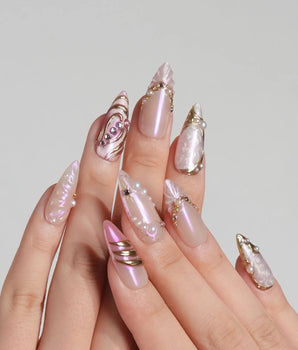 Neon Kiss press-on nails with pink chrome, pearl accents and 3D butterfly wing nail art