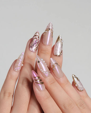 Neon Kiss press-on nails with pink chrome, pearl accents and 3D butterfly wing nail art
