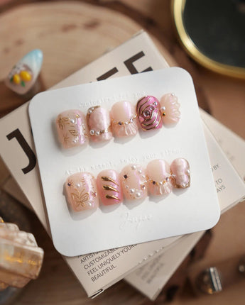 Neon Kiss extra short coffin press-on nails with pink chrome butterfly wings and pearls
