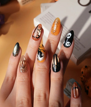 Nevermore press on nails with a black cat on a 3D copper pumpkin, a raven on a branch under an amber moon, ghosts and bats - image 2