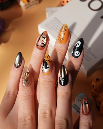 Nevermore press on nails with a black cat on a 3D copper pumpkin, a raven on a branch under an amber moon, ghosts and bats - image 2