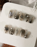 Night Butterfly press-on nails in extra short coffin shape — black ombre chrome 3D gothic nails