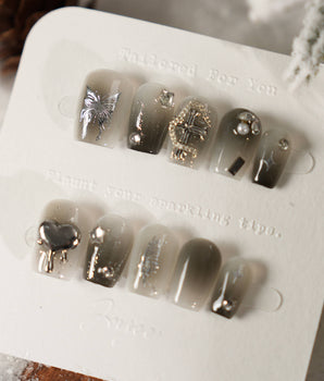 Night Butterfly press-on nails in extra short coffin shape — black ombre chrome 3D gothic nails