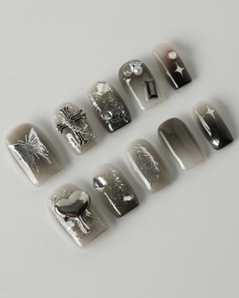 Night Butterfly press-on nails in extra short square shape — black ombre chrome 3D gothic nails