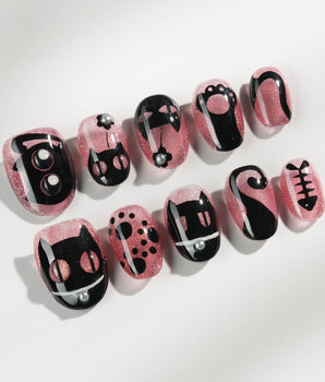 Night Prowler handmade press-on nails featuring dusty pink black cat hand-painted 3D details nails
