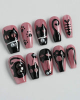 Night Prowler press-on nails — dusty pink black cat