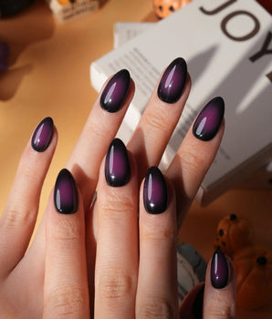 Nightshade press on nails in deep glossy aubergine purple that reads almost black - image 1