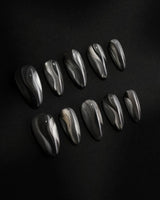Noir Ribbons nails in medium almond — Phantom Black & Deep
