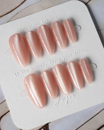 Nude Blush cat-eye press-on nails in medium almond shape — blush pink cat eye nails