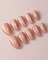 Nude Blush cat-eye press-on nails in extra short almond shape — blush pink cat eye nails