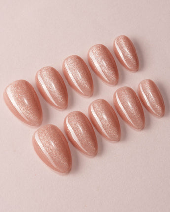Nude Blush cat-eye press-on nails in extra short almond shape — blush pink cat eye nails