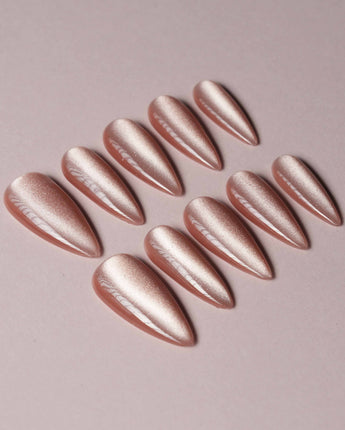 Nude Blush cat-eye press-on nails in long stiletto shape — blush pink cat eye nails