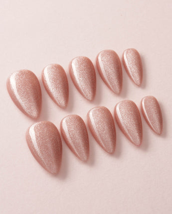 Nude Blush cat-eye press-on nails in short stiletto shape — blush pink cat eye nails