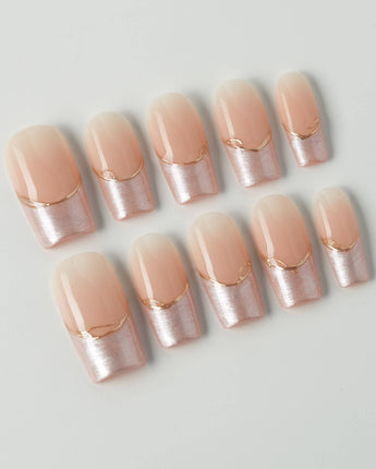 Your Glow in medium square shape with glossy nude French tips and metallic gold detail