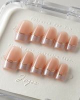 Your Glow in short square shape with nude cat-eye French tips and gold line detail