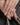 Nude and gold Christmas nails with 3D bow design