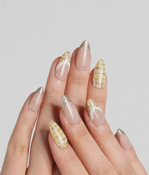 Tweed Light handmade press-on nails featuring nude base gold glitter french tips yellow plaid lace trim