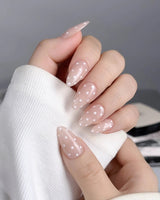 Cloud Cream press-on nails — Peach Nude, Sweet White Polka Dots. handmade nail art by Joyee Nails