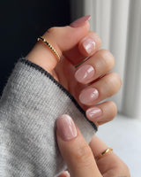 Nude Blush cat-eye nail art close-up showing blush pink cat eye nails details
