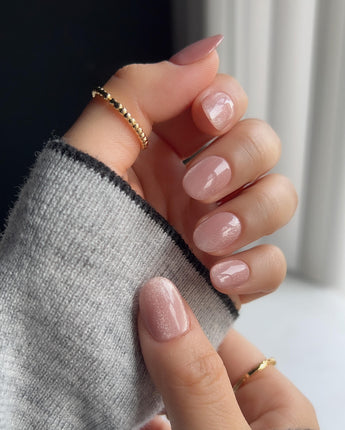Nude Blush cat-eye nail art close-up showing blush pink cat eye nails details