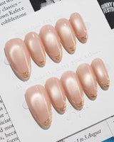 Nude Spark press-on nails — Premium Champagne Cat Eye, Irregular French Metal Outlines. handmade nail art by Joyee Nails