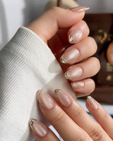 Nude Spark nail art close-up showing Premium Champagne Cat Eye, Irregular French Metal Outlines. details