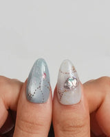 Ocean Heart medium almond nails with antique gold and teal chrome ocean creatures