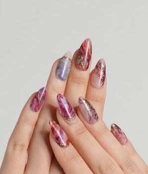 Baroque Palette press-on nails with painterly marble mix, pink red swirls and gold details