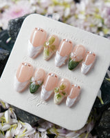 Duchess Olive 3D Floral nails with olive green French tips and raised floral accents