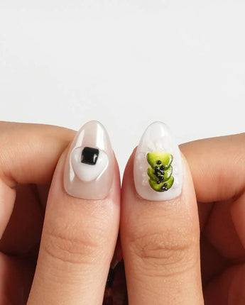 Omakase close-up of miniature sushi nail art with textured gel details