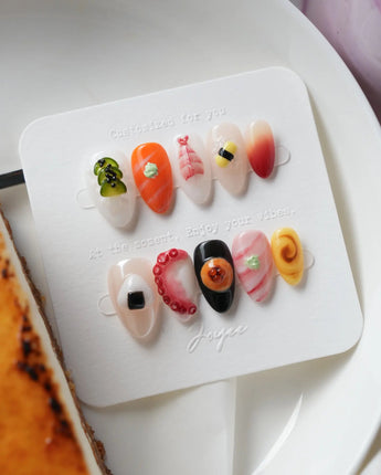 Omakase handmade 3D sushi press-on nails with nigiri, octopus, and roll details