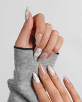 Opal Moon medium almond nails with translucent aurora opal dot details