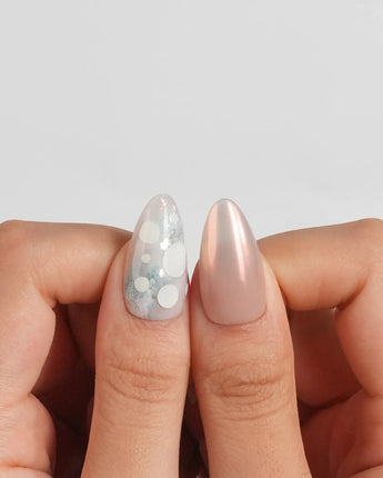 Opal Moon glossy press-on nails with irregular opalescent dots like gemstones