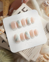 Opal Moon extra short coffin press-on nails with aurora opal dot accents