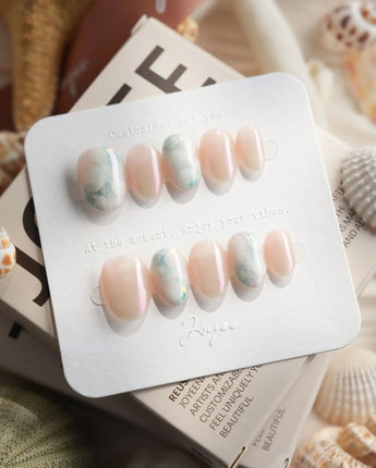 Opal Moon extra short oval press-on nails with rose-gold chrome and milky opal dots
