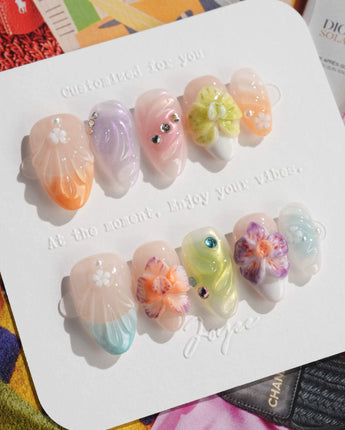 Orchid-Extra Glow press-on nails in extra short almond shape — Colorful Summer, 3D Orchids & Shell Textures.