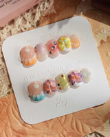 Orchid-Extra Glow press-on nails in extra short squoval shape — Colorful Summer, 3D Orchids & Shell Textures.