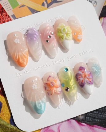 Orchid-Extra Glow press-on nails in medium almond shape — Colorful Summer, 3D Orchids & Shell Textures.