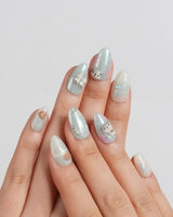 Otter Momo custom-size nails with 3D otters, fish bones, petals, and starfish